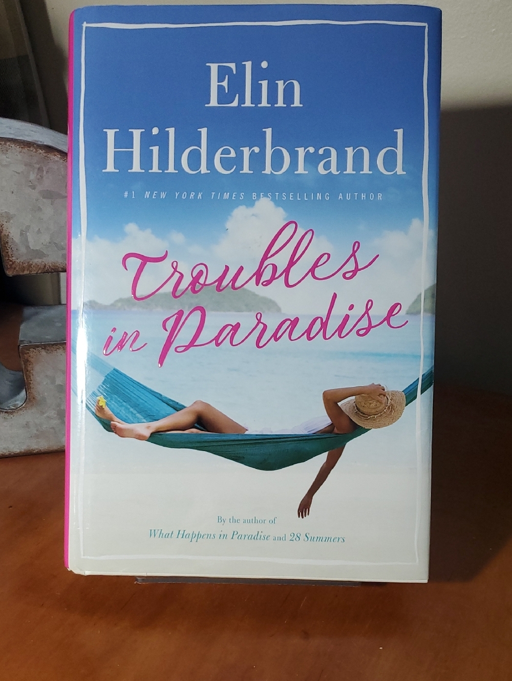 Elin Hilderbrand Troubles in Paradise - Blue & Pink Hardcover Book